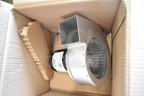 Cardboard box containing a metal fan component for the Blodgett Invoq Hybrid Hoodini 10-2/1GN commercial oven.