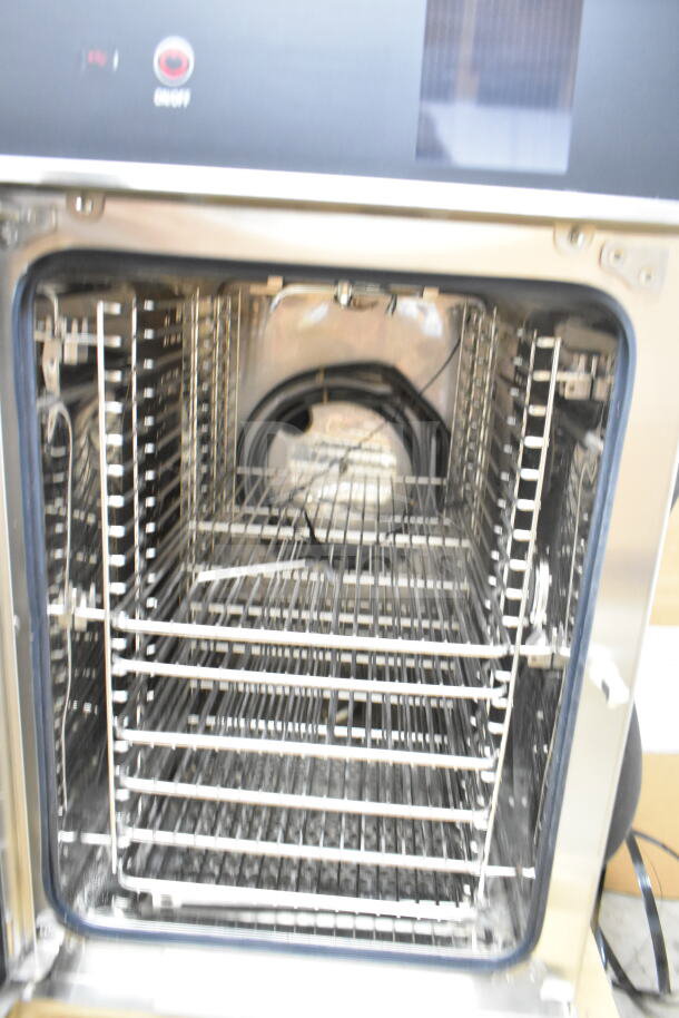 BRAND NEW 2025 Blodgett BLCT-10E-H combi oven. Interior view, electric, 208V, 3-phase, ventless hood, scratch and dent condition.