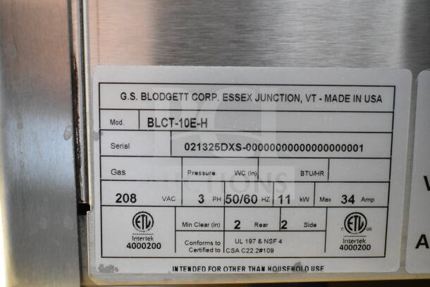 Label on a Blodgett BLCT-10E-H commercial oven showing model, serial number, 208-volts, 3-phase, ETL certification, made in USA.