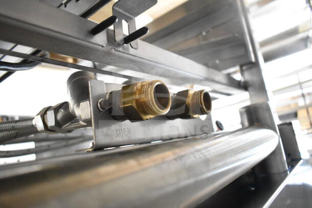 Close-up of a Blodgett BLCT-101 / CPE 1.10 combi convection oven's brass fittings and metal piping. Brand new, 208V, 3-phase.