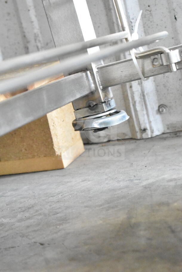 2019 Blodgett Mark V-100 convection oven caster on equipment stand, with visible metal frame and zip tie.