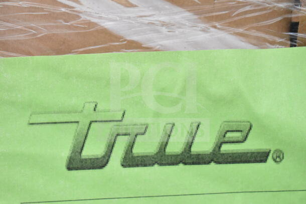 Alt text: Green label with "True" logo, indicating brand of True TSCI-600R-G-PH Commercial Cooler.