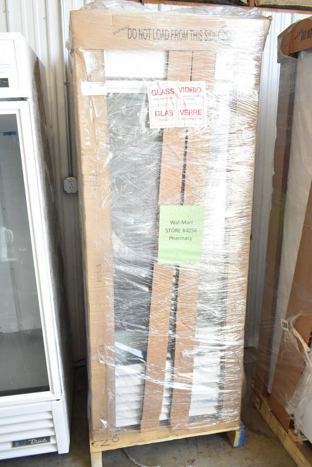Brand new 2026 True TSCI-600R-G-PH commercial cooler, single door, scratch and dent condition, 115V, in packaging.