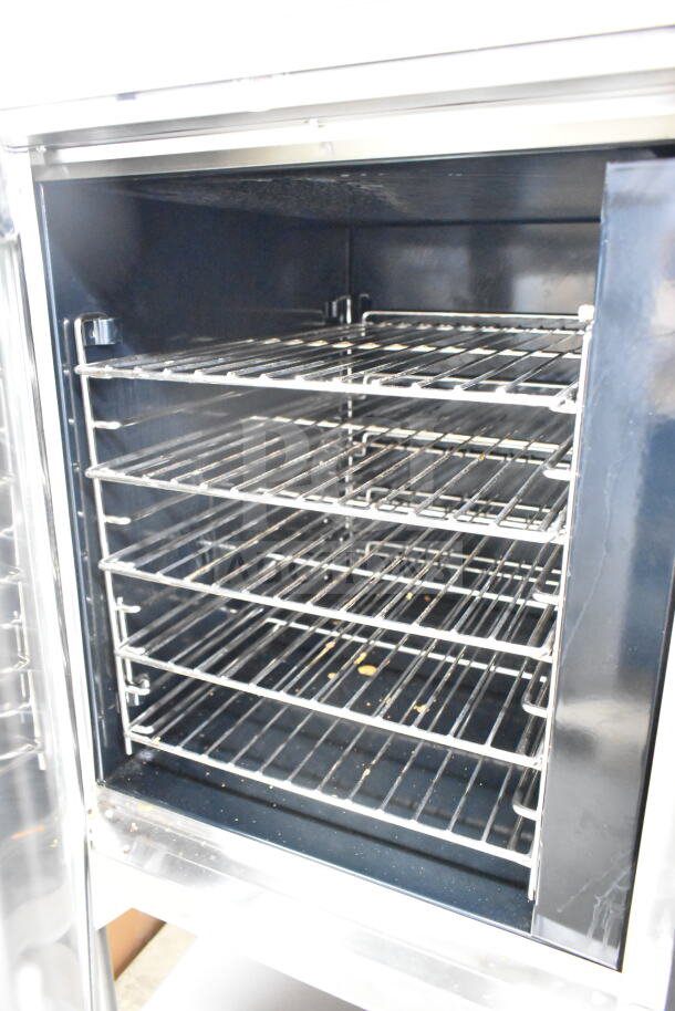 BRAND NEW 2021 Blodgett VLH half-size convection oven, electric powered, with commercial casters and hood.