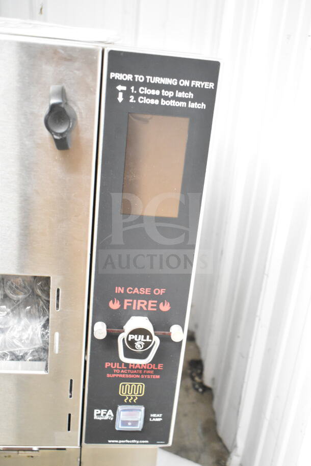 Perfect Fry PFA730 ventless countertop deep fryer, new scratch and dent, 208V, 1 phase, with fire safety instructions.