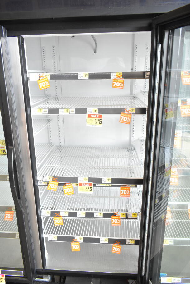 2020 True GDM-72-HC 3-door reach-in cooler merchandiser in good condition. 115 volts, 1 phase.