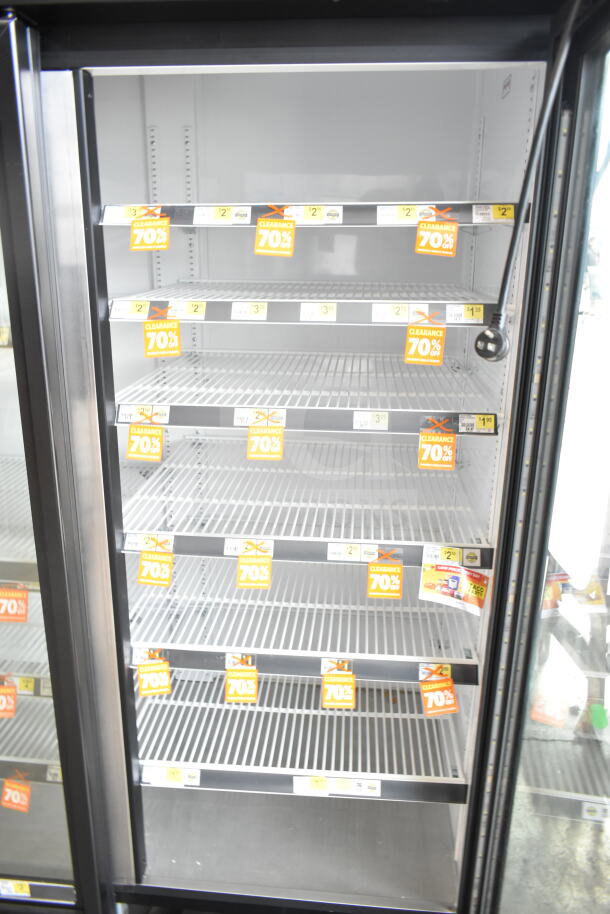2020 True GDM-72-HC commercial cooler, 3-door design, clearance labels, white shelving, 115V, 1-phase.