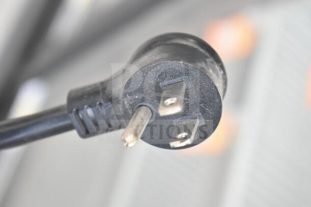 Close-up of a power plug for the 2020 True GDM-72-HC commercial reach-in cooler, 115 volts, 1 phase.