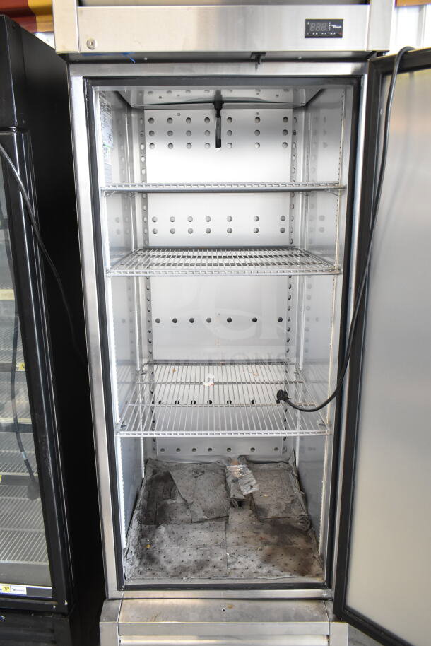 2019 True T-23F-HC commercial single door reach-in freezer, 115V, 1 phase, stainless steel, with 3 adjustable shelves.