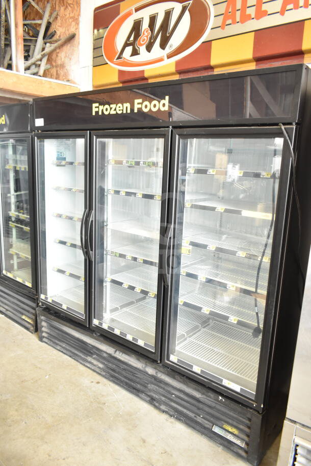2020 True GDM-72F-HC commercial freezer with three glass doors, showing empty shelves. Model: GDM-72F-HC.
