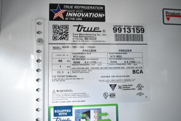 2020 True GDM-72F-HC 3 Door Freezer Merchandiser label showing model, serial number 9913159, voltage, and refrigerant details.