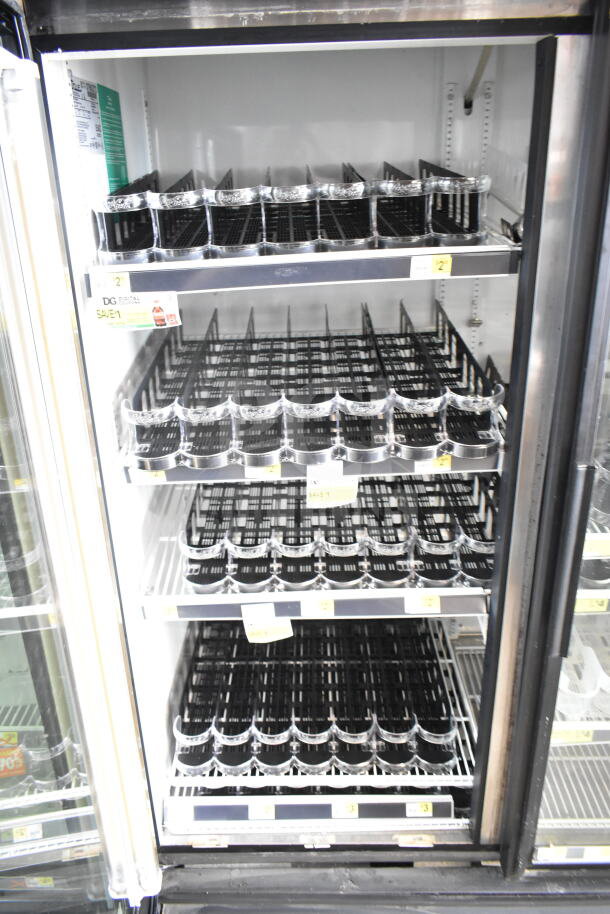True GDM-49 Commercial 2 Door Reach In Cooler Merchandiser; 115 Volts, 1 Phase, adjustable shelves, with labels showing.