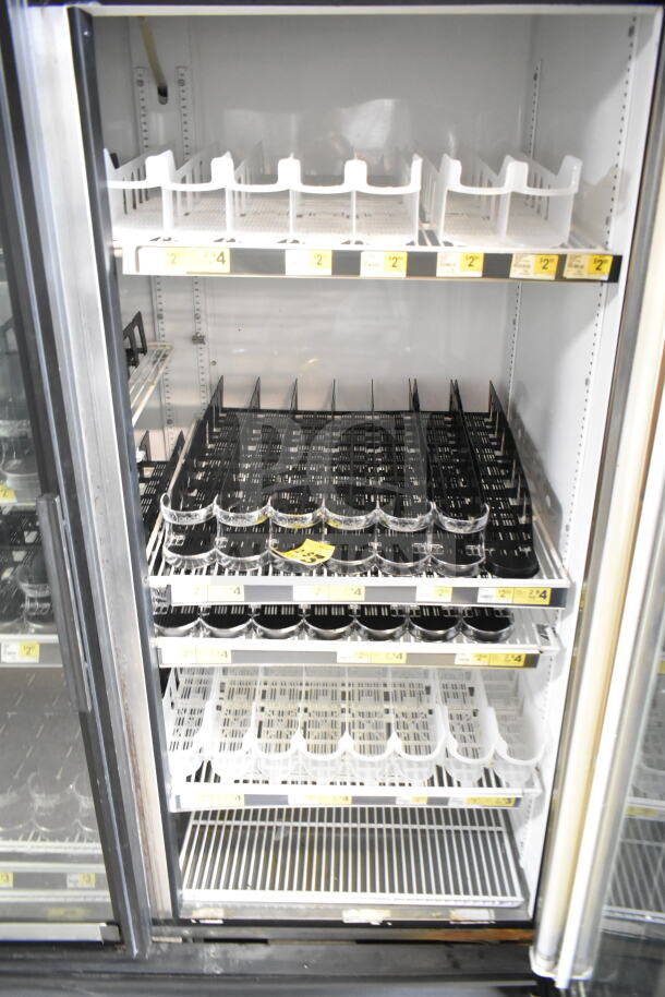 True GDM-49 Commercial 2 Door Cooler, 115V, 1 Phase. Features ample shelving, clean interior, excellent for merchandising.