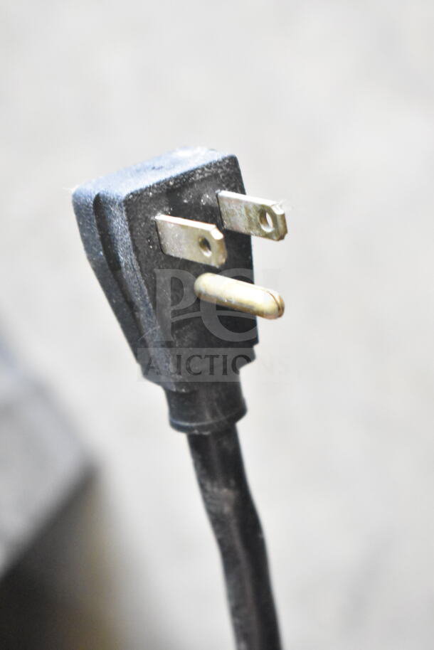Close-up of the True GDM-49 cooler's power plug. Standard 115 volts, 1 phase plug in good condition.
