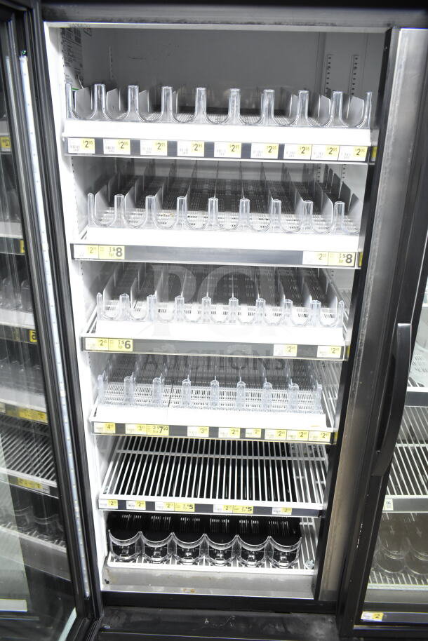 2020 True GDM-72-HC commercial 3-door cooler with adjustable shelves, clear doors, 115 volts, 1 phase. Excellent condition.