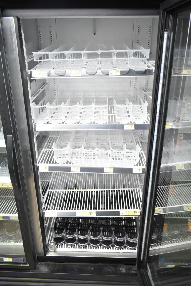2020 True GDM-72-HC commercial 3-door cooler, 115 volts, 1 phase. Features include adjustable shelving. Excellent condition.