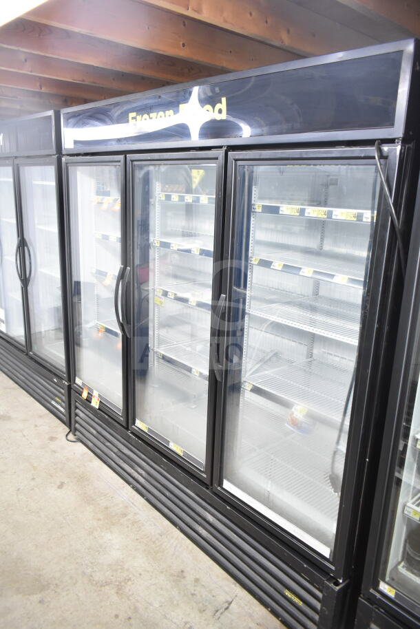 2020 True GDM-72F-HC Commercial 3 Door Reach-In Freezer Merchandiser, glass doors, shelving, good condition.