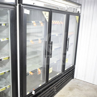 True GDM-72 commercial 3-door reach-in cooler merchandiser, 115 volts, 1 phase, glass doors, steel shelves, used condition.