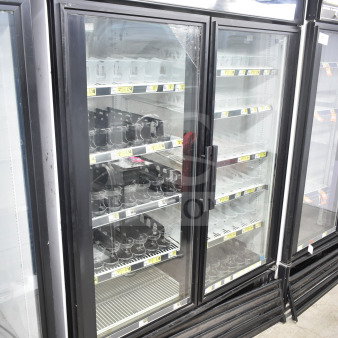 True GDM-49 commercial 2-door reach-in cooler merchandiser, 115 volts, 1 phase, with glass doors and interior shelving.