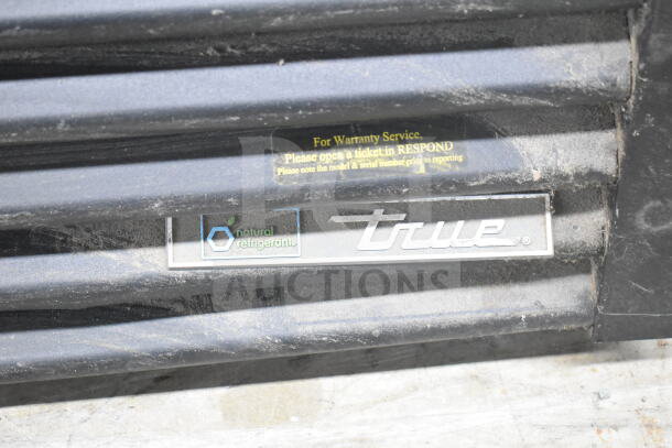 2020 True GDM-26F-HC cooler merchandiser, natural refrigerant label, "For Warranty Service" note visible.