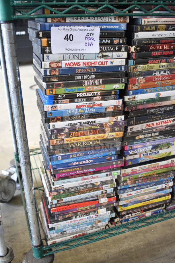 Collection of 164 DVDs, featuring titles like "Little Fockers," "Polar Express," "Lion King." Includes movies and TV series.