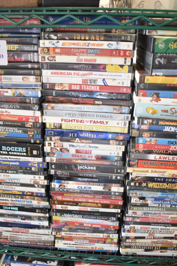 Collection of 340 DVDs featuring titles like "8 Mile," "Catch Me If You Can," "The Simpsons," and more. Mixed condition.
