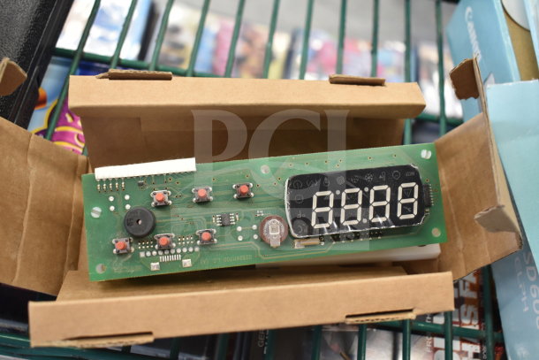 EVX234N5FXXXX01 panel in a cardboard box, featuring buttons and a digital display. Appears unused.