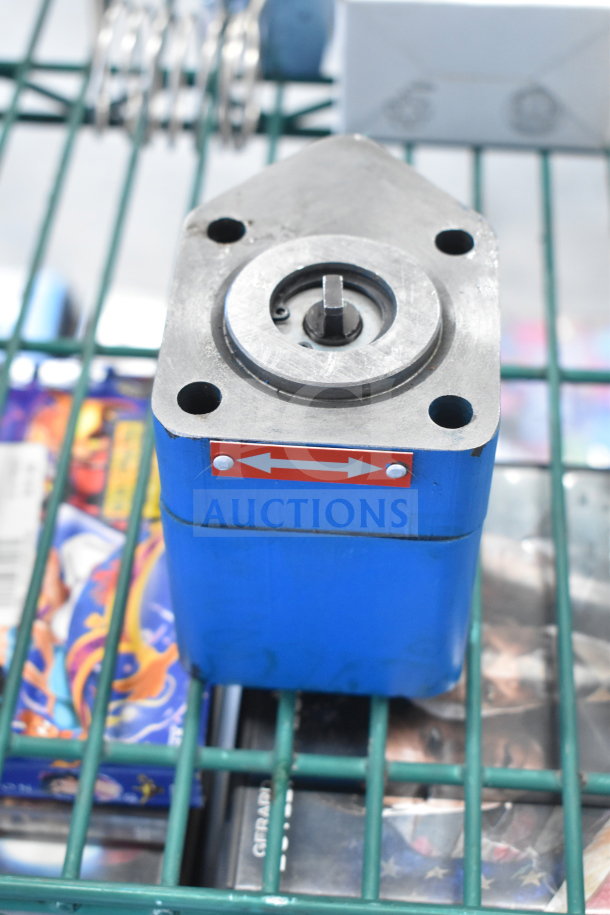 Blue Fryclone Oil Pump model 259POFM728L in good condition, on a green metal shelf. Red label indicates flow direction.