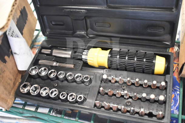 Tool set in hard black case with yellow and black handle, sockets, and bits, part of 4-item auction lot.