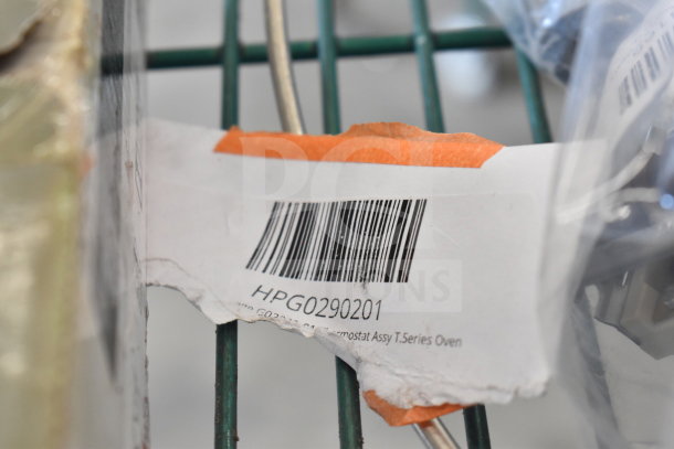 6 various items including FWE CONTACT2POLE120V relay, Garland thermostat for T.Series oven, barcode label visible.