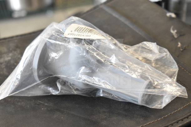 Noble Warewashing 49512024703 Square Basket Bushing for HTGW, new, in clear packaging with barcode and label.