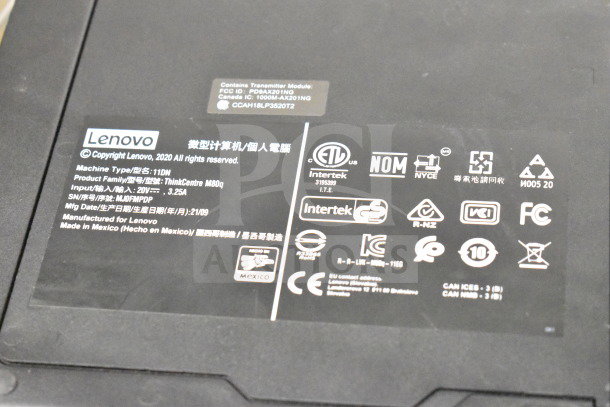 Close-up of Lenovo ThinkCentre M80q label showing model, machine type 11DN, input details, and various certification logos.