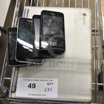 Samsung laptop with 4 used smartphones, visible wear. Auction tag with quantity 5x indicates lot details.