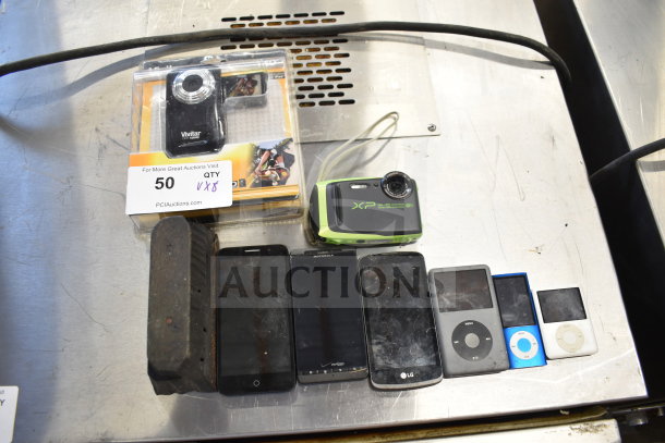 Eight electronic items including iPods, smartphones, a Vivitar camera, and a Fujifilm XP camera. Some wear visible.