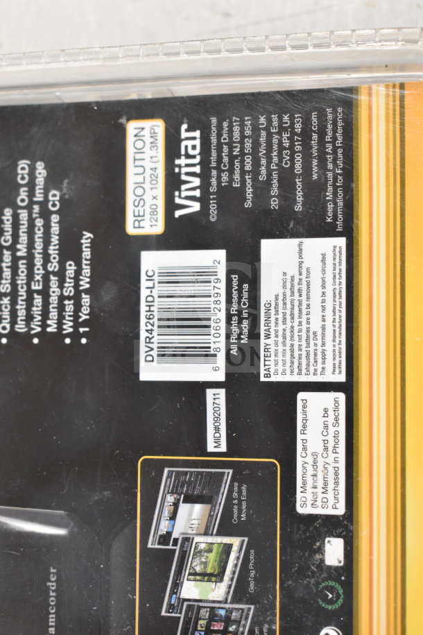Packaging back of Vivitar DVR426HD-LIC camcorder; includes resolution details (1280x1024, 1.3MP), barcode, and warning labels.
