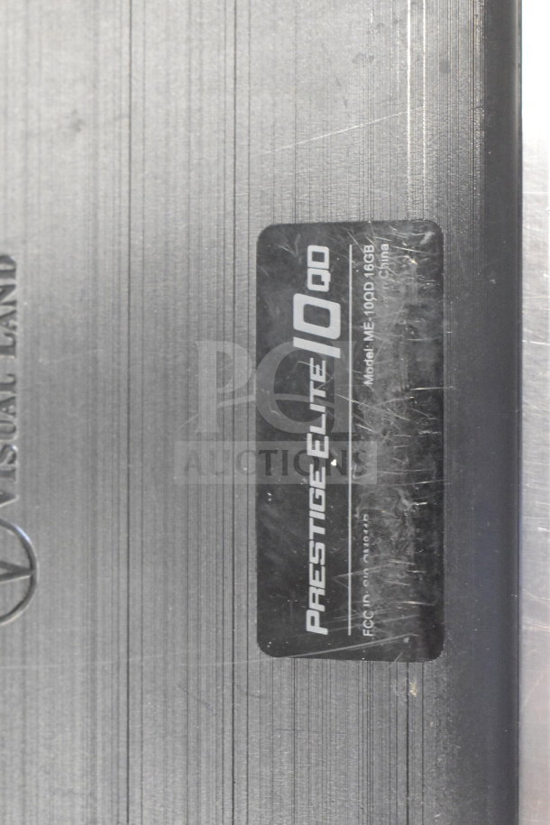 Visual Land Prestige Elite 10QD tablet, model ME-10QD 16GB, showing label and metallic textured surface.