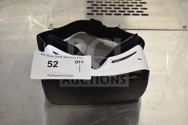 Samsung SM-R322 Gear VR Oculus headset, white and black, visible wear. Auction tag marked as item 52.
