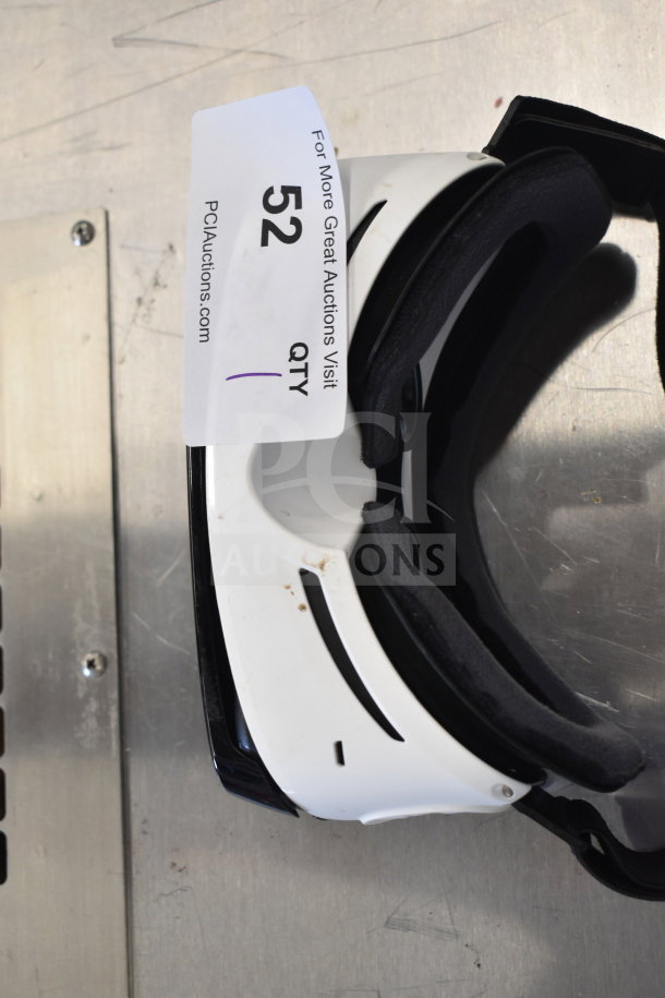 Samsung SM-R322 Gear VR Oculus, white with black trim, some wear, auction tag number 52 visible.