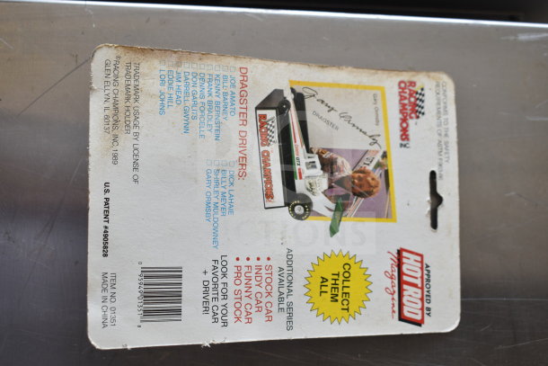 Racing Champions die-cast car packaging featuring dragster drivers, item no. 01351, shows slight wear. Made in China.