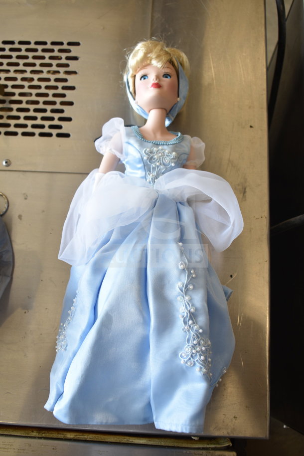 Cinderella doll in blue gown with intricate embroidery, part of a 15-item auction lot. Near-mint condition.