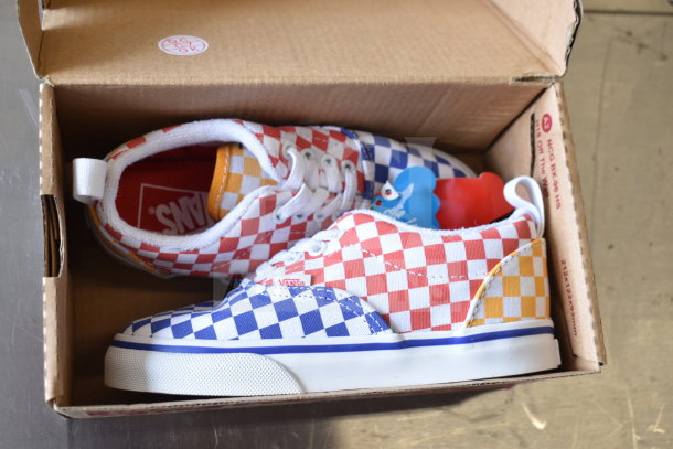 Vans Era Elastic Lace Tri Checkerboard Shoes, size 9, in box. Features red, blue, yellow checkered pattern. New condition.