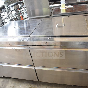 Delfield D4460NP-24M-A5 commercial 4-drawer prep table on casters, stainless steel, 115V, 1 phase, robust and durable.