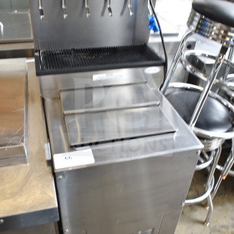 Cornelius 6 Flavor Carbonated Beverage Machine on CB1522 Ice Bin, stainless steel, good condition, with dispensing taps.