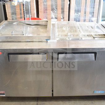 Turbo Air MST-60-24 commercial prep table on casters, stainless steel, 115 volts, 1 phase, visible warranty stickers.