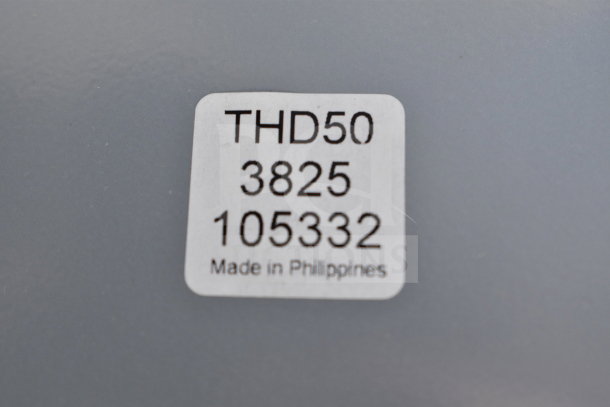 "Taylor THD50 scale label showing model number, serial, and 'Made in Philippines'. New, scratch and dent condition."