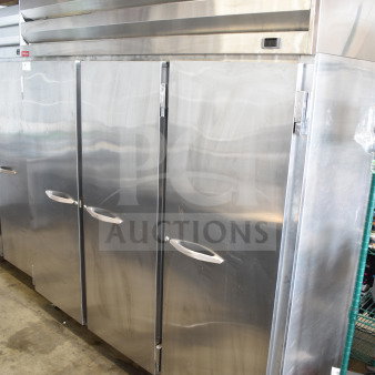 McCray SF75-DG 3-door reach-in freezer in stainless steel, commercial grade, 115/208-230V, 1 phase, on casters.