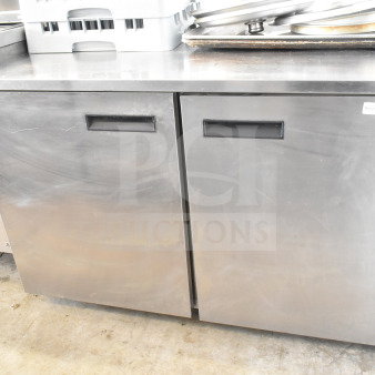 Delfield commercial 2-door undercounter cooler, stainless steel, 115 volts, 1 phase, includes Delfield branding.