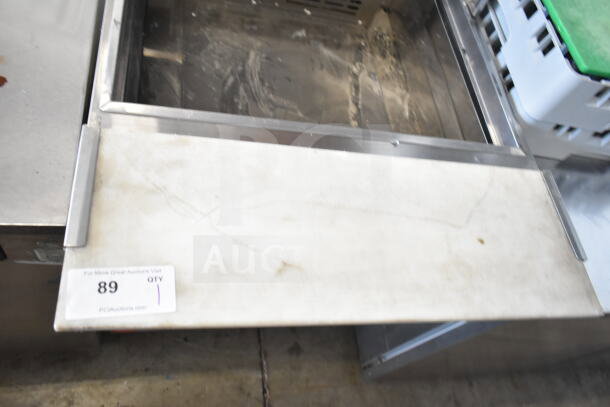 Turbo Air PST-28-12-D2-N prep table with two drawers, visible wear. Tag reads "89 QTY 1 PCIauctions.com". 115V, 1 Phase.