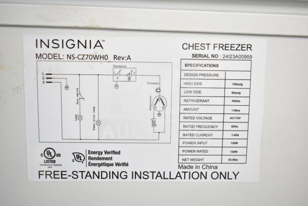 Insignia NS-CZ70WH0 chest freezer label showing model, specs: 115 volts, 1 phase, refrigerant R600a, 63.9 lbs.