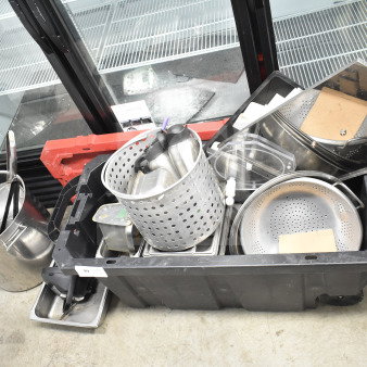 Lot of kitchen items including colander, stock pot, China cap strainer, and air pot in a plastic bin. Mixed condition.